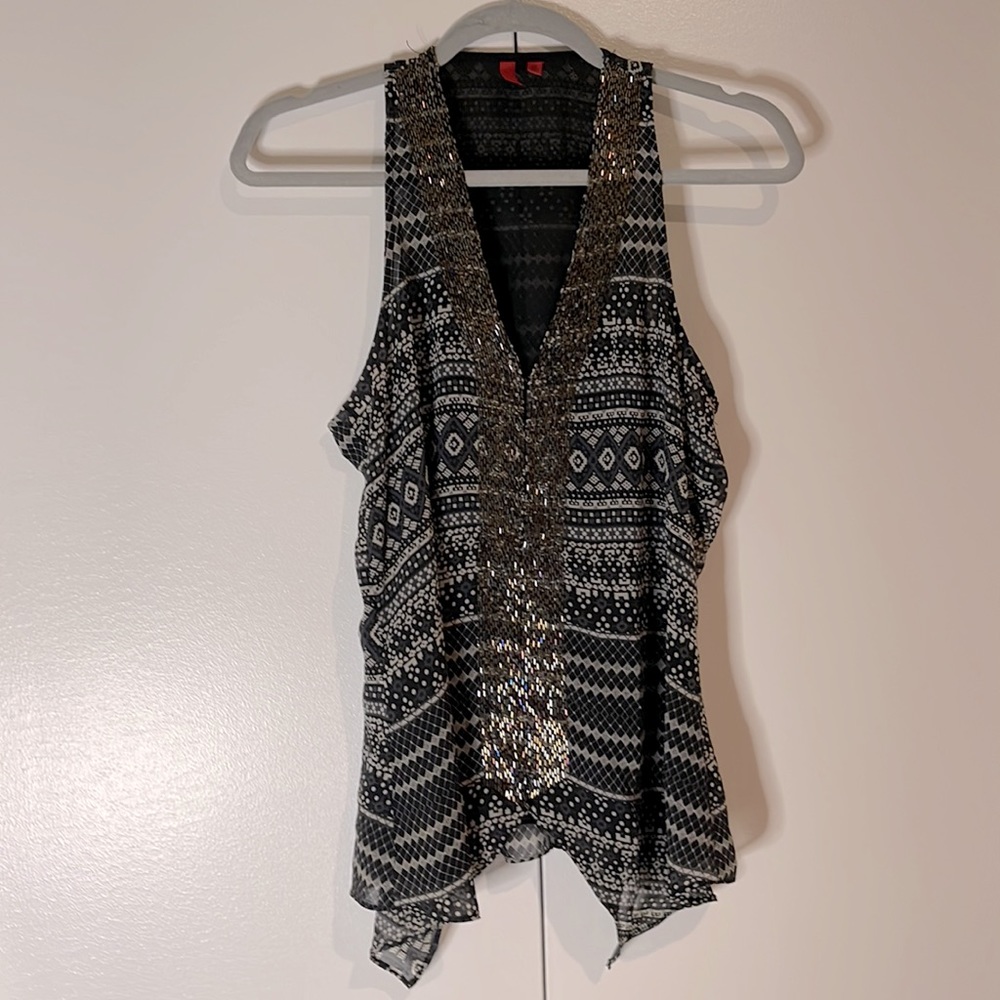 Unique beaded going out top; black patterned;size M